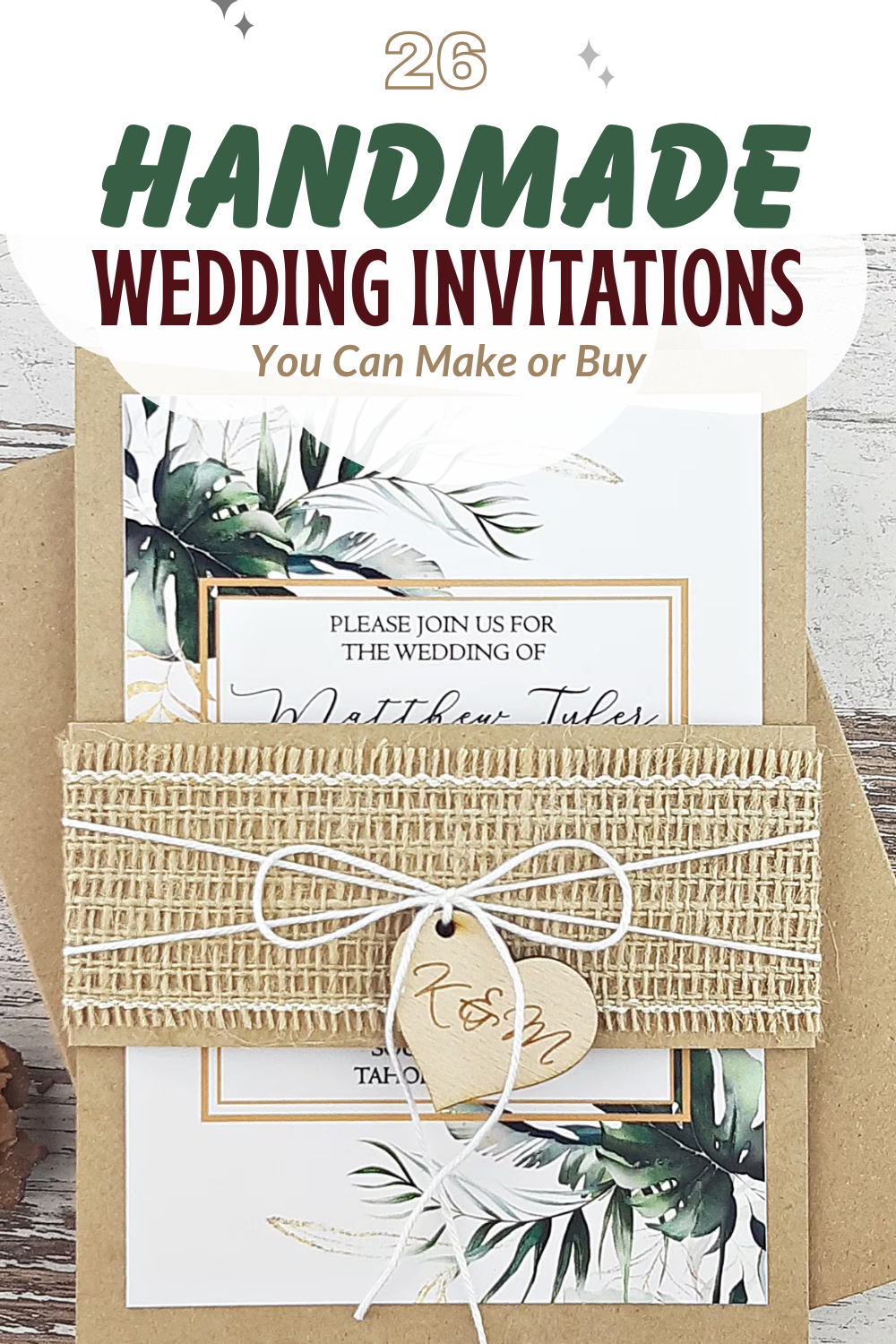 A rustic handmade wedding invitation with burlap wrap, twine, and a round wooden tag, displayed on a white surface with a leaf-themed card underneath. Text above highlights our unique handmade wedding invitations.