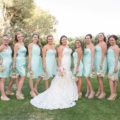 bride with bridesmaids in blue dreses at Classic Club