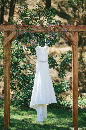 gown hanging from arbour