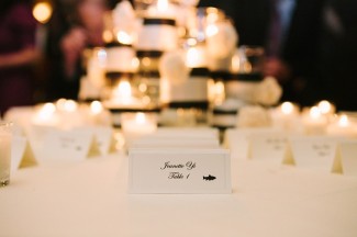 black and white escort card at Arctic Club Hotel wedding reception 
