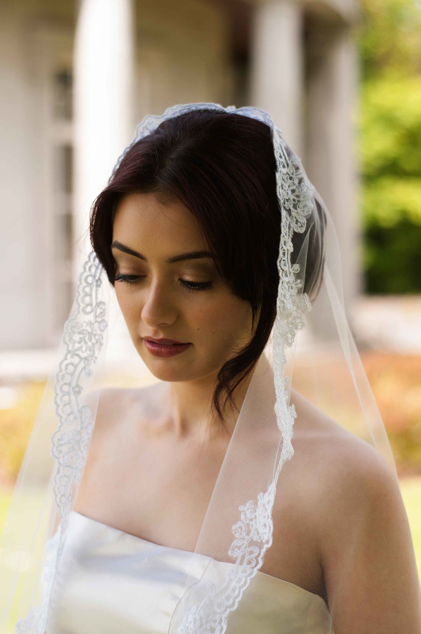 model in lace edge veil