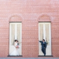 newlyweds in windowed brick