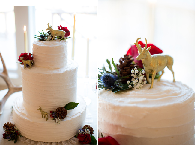 White wedding cake with gold stags 