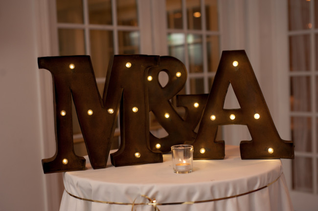 Bride and groom initials in a light up marquee 