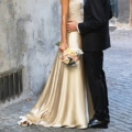 Bride-wearing-a-silk-dress-standing-with-groom-in-the-streets-of-italy1