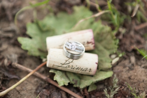 wedding rings on top of wine corks