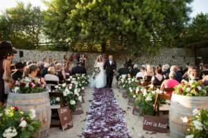 backyard wedding ceremony with petal aisle