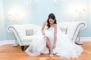 bride on couch at Villa Amore