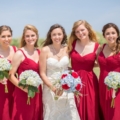 bridesmaids in bright red dresses
