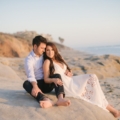 engaged couple on rocks