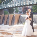 newlyweds by river in greensville