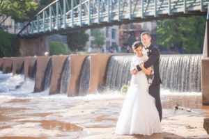 newlyweds by river in greensville