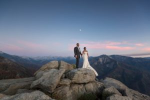 newlyweds on rocks at Sequoia National Park