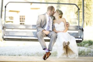 newlyweds on ski gondola