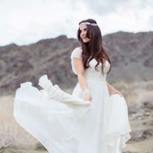 bride-twirling-wedding-dress-in-califonia-desert