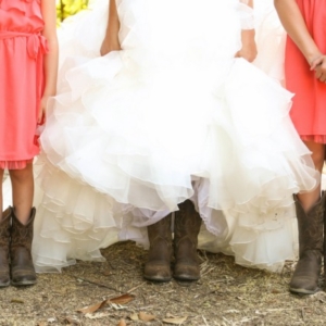 bride and kids in cowboy boots