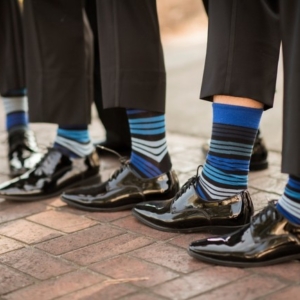 groomsmen showing striped socks