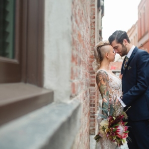edgy styled couple in Victoria alley