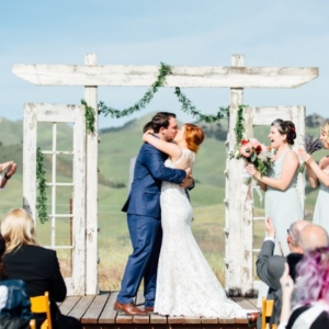 bride and groom kiss