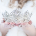 bride with crown in both hands