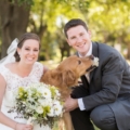 newlyweds with their dog
