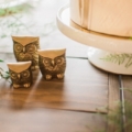 three gold figurine owls