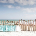 bridal party lined up on beach