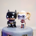 cartoon batman and wonder woman cake topper