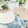 powder blue napkin and geometric marble tablescape
