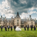 bridal party stand in front of Biltmore Hotel