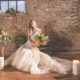 styled seated bride in art deco gown
