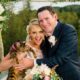 groom with bride holding pet cat