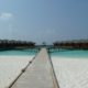 sandy beach water bungalows