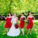 bridal-party-wearing-red-knee-length-dresses