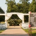 outdoor ceremony with chalkboard sign
