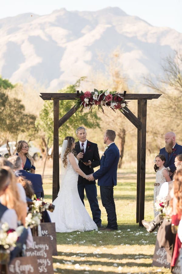 bride-groom-officiant-ceremony-photo-candid