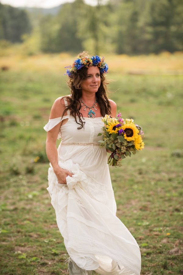 Bridal portrait in off-shoulder linen gown with flower crown
