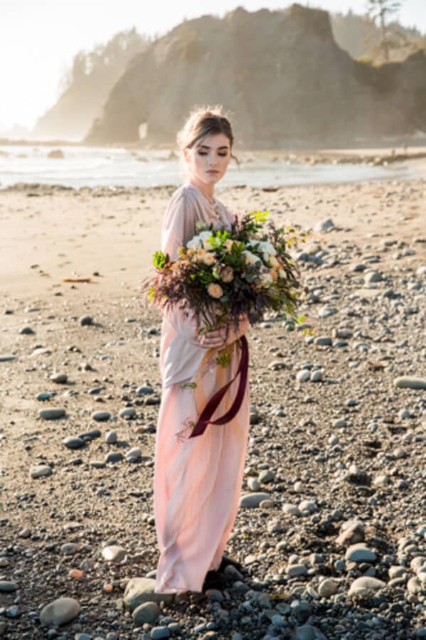 Bridal portrait posed on beach at Olympic National Park