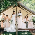 bridal-party-group-portrait-outdoor-tent-trademark-venues