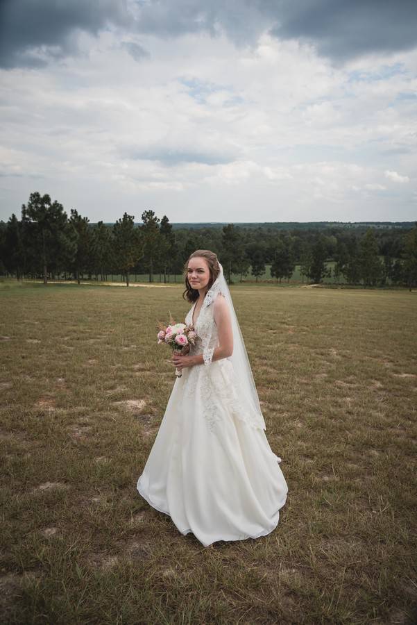 bridal-portrait-v-neck-gown-half-length-veil