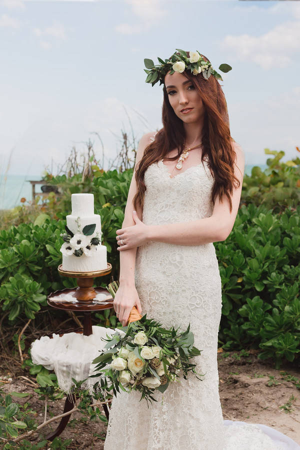 Bride in fitted A-line gown with flower crown