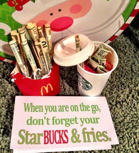 A McDonald's fries container filled with rolled cash, a Starbucks cup with cash and gift cards, and a sign that says, "When you are on the go, don't forget your StarBUCKS & fries"—perfect creative money gifts for memorable gifts they'll love!.