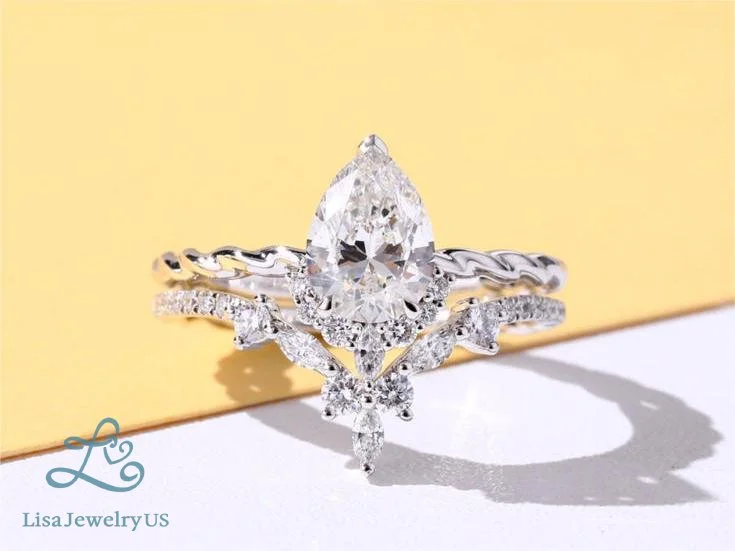 1ct-Pear-Shaped-Lab-Grown-Diamond-Eternity-Twisted-3-Prong-Engagement-Ring-Set