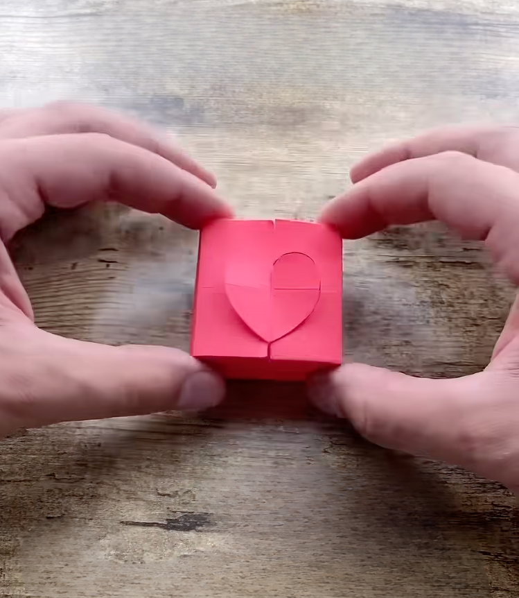 Origami paper heart gift box