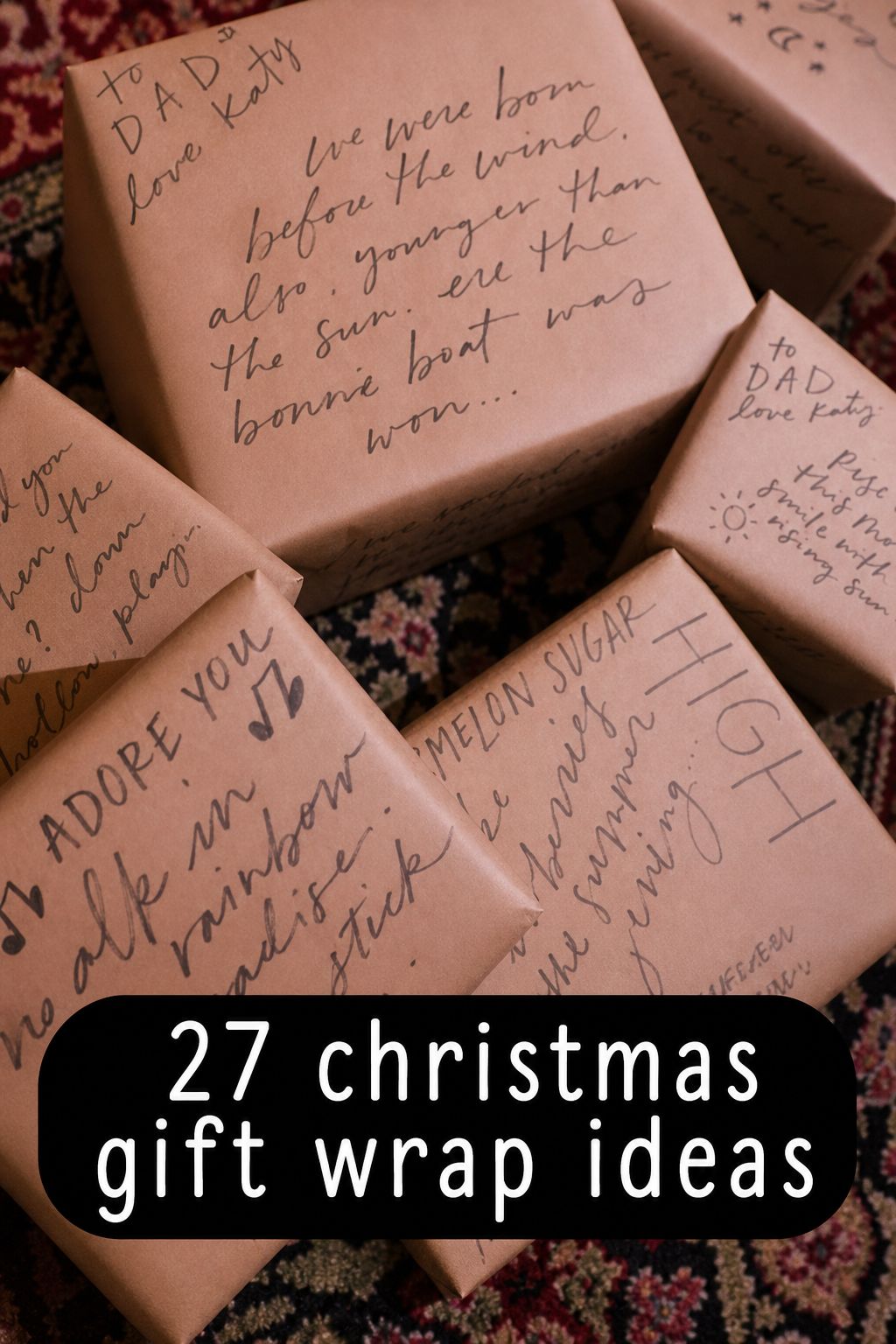 Several gifts wrapped in brown paper with handwritten messages and decorated with black ink, placed on a patterned rug. Text overlay reads, “27 christmas gift wrap ideas.” Discover inspiring Christmas Wrapping Ideas and creative Gift Wrapping techniques to elevate your holiday gifting this season.