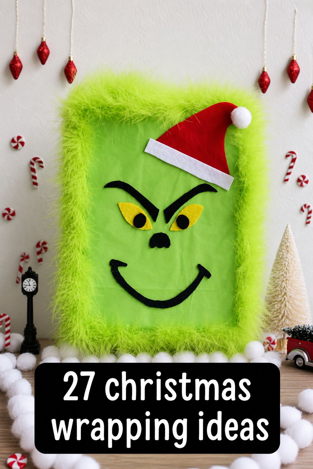 Green gift box decorated as the Grinch with a Santa hat, surrounded by Christmas ornaments. Text reads “27 Christmas Wrapping Ideas.” Find unique Christmas wrapping inspiration to make your gifts stand out this season.